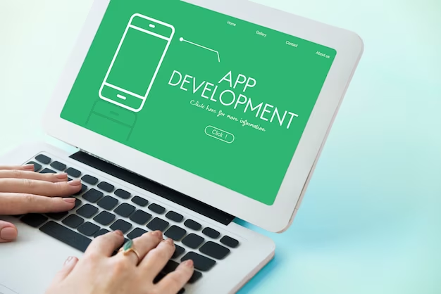 A man develops an application on a laptop